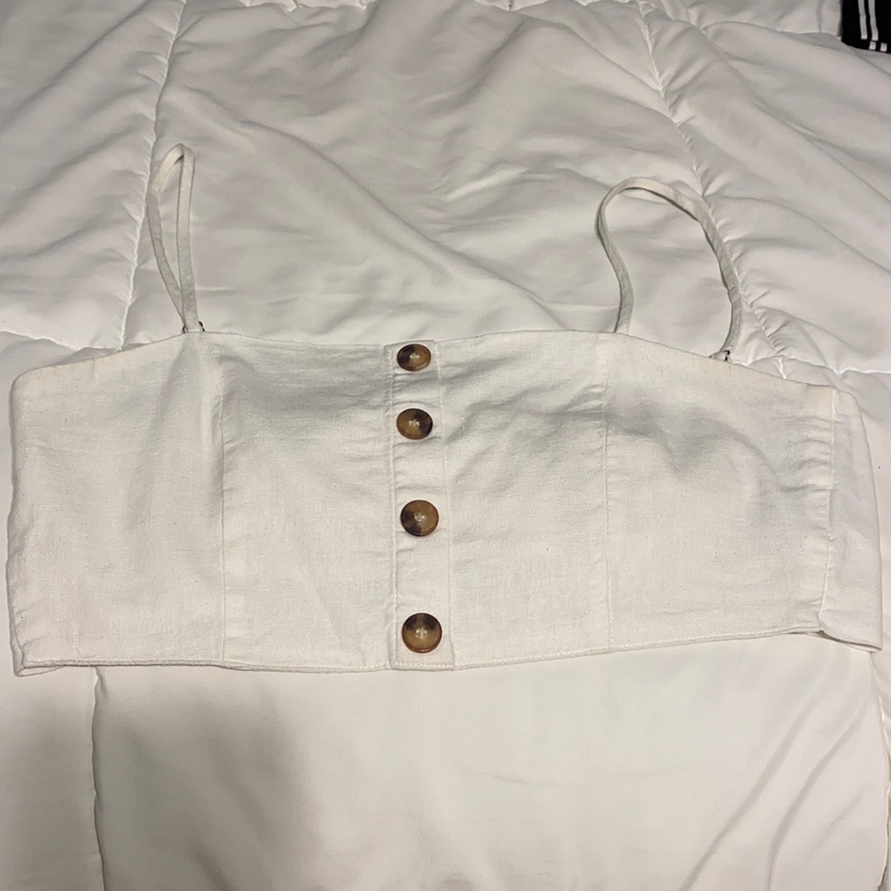 White top, ties in back